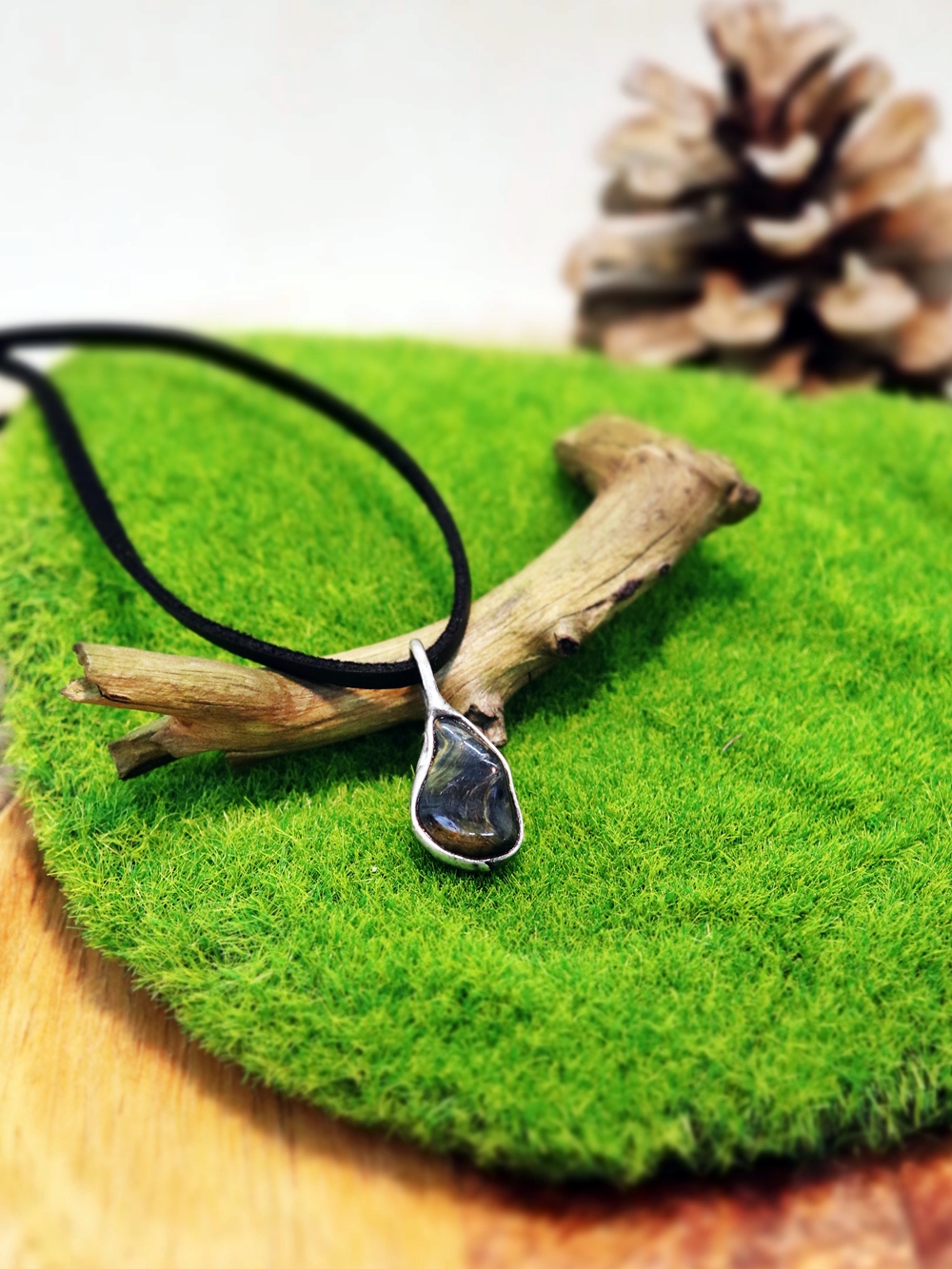 přívěsek s býčím okem